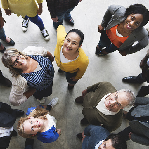 Overhead view of various types of people looking up